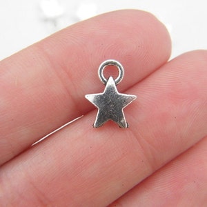BULK 50 Star charms antique silver tone S5