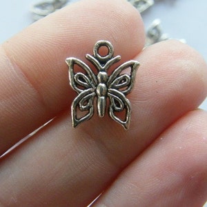 12 Butterfly charms antique silver tone A334