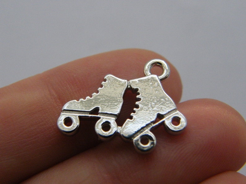 4 Roller skate charms silver tone SP189 Etsy