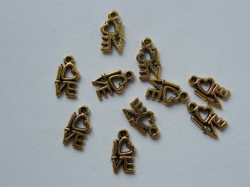 34 LOVE charms antique gold tone M242 image 2