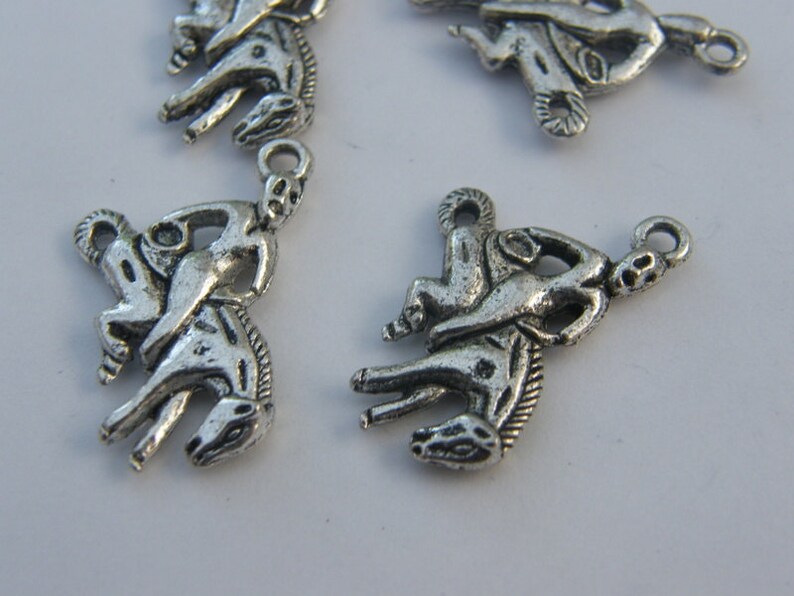 BULK 30 Rodeo charms antique silver tone A584