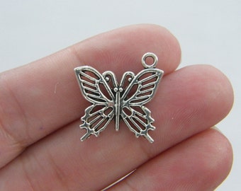 8 Butterfly charms antique silver tone A347