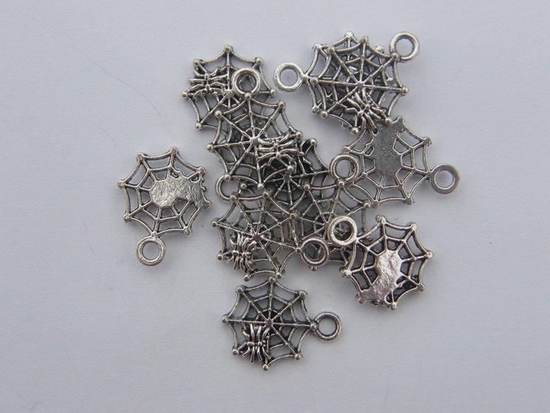 BULK 50 Spider in a spiderweb charms tibetan silver HC124