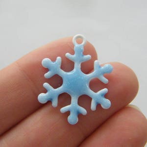 4 Snowflake charms blue and white enamel tone CT237