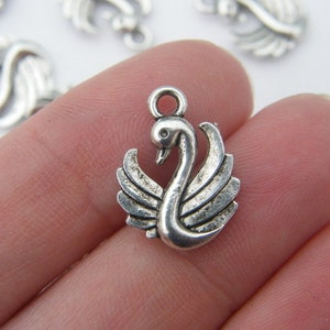 10 Swan charms tibetan silver B9