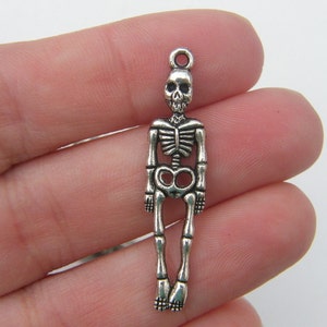 6 Skeleton pendants antique silver tone HC119