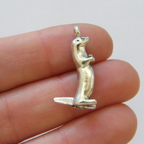 4 Otter charms antique silver tone A1078