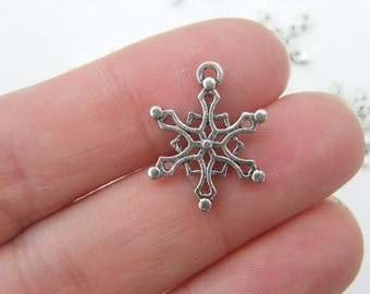 10 Snowflake charms antique silver tone SF16