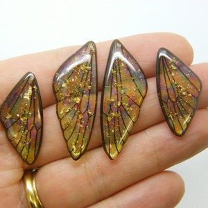 4 Butterfly insect wing set charms resin A455
