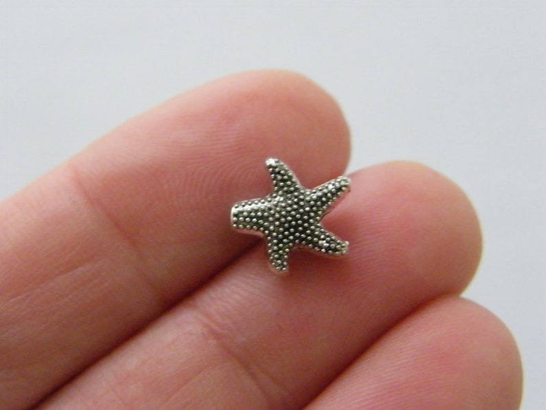 BULK 50 Starfish spacer beads antique silver tone FF529