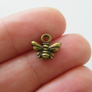 12 Bee charms antique bronze tone A855