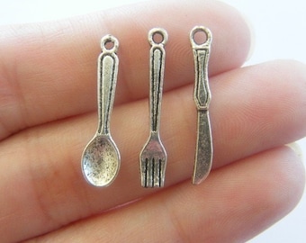 The Cutlery Collection - 24  antique silver tone charms