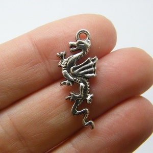 8 Dragon charms antique silver tone A164