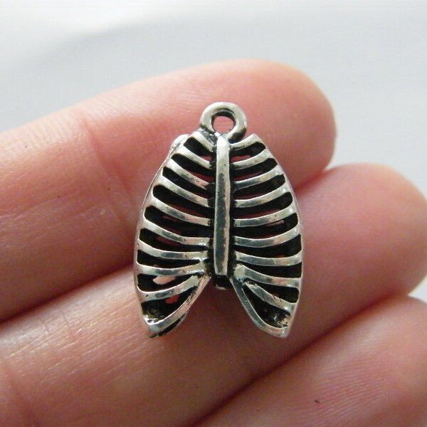 4 Rib cage pendants antique silver tone MD66