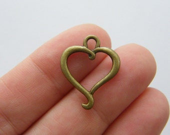 10 Heart charms antique bronze tone H76