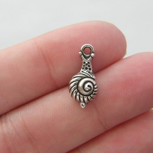 12 Sea snail charms antique silver tone A201