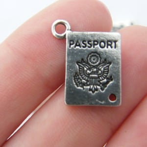 8 breloques passeport ou connecteurs ton argent antique WT55