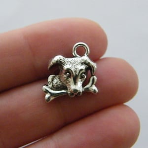 6 Dog charms antique silver tone A1029