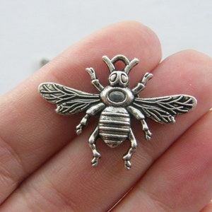 4 Bee charms antique silver tone A313