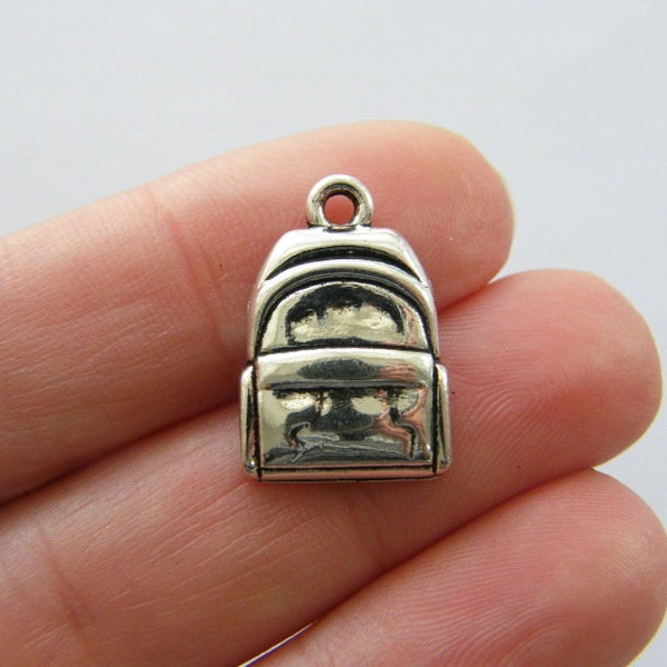 10 Backpack charms antique silver tone CA93