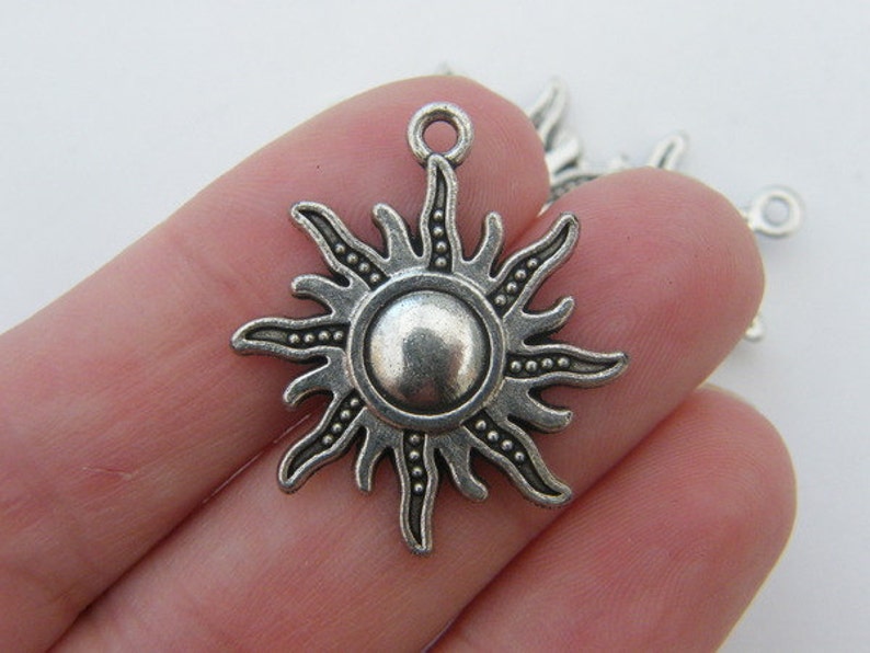 6 Sun pendants antique silver tone S63 image 1