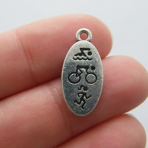 6 Swim bike run charms antique silver tone SP67