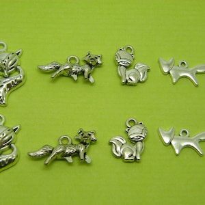 The Fox Collection - 8 antique silver tone charms