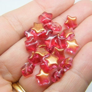 30 Star beads AB red glass AB269