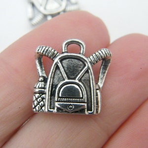 10 Backpack charms antique silver tone CA48