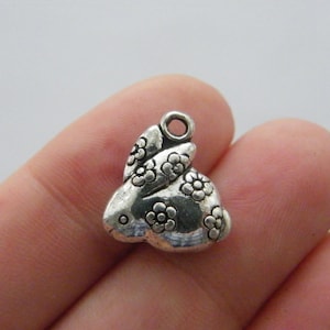 8 Rabbit charms antique silver tone A111