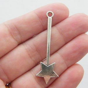 8 ciondoli a forma di bacchetta in argento tibetano antico P212