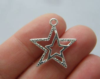 8 Star charms silver plated tone S44