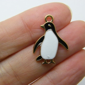 4 Penguin charms white black and bright gold tone A1286