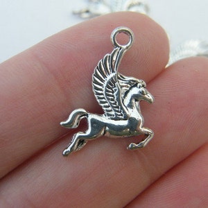 10 Pegasus charms antique silver tone A579