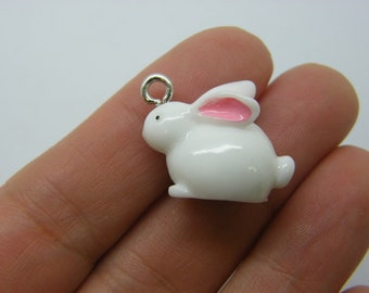 4 Rabbit pendants white pink resin A527