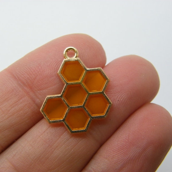 8 Honeycomb charms orange resin and gold tone A534