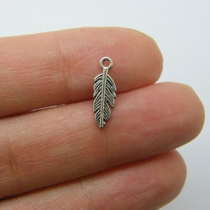 18 Feather charms antique silver tone B143
