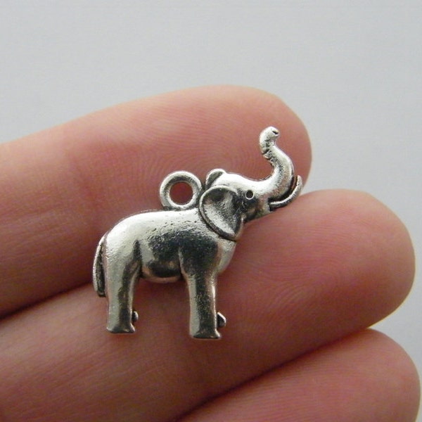 4 Elephant charms antique silver tone A1