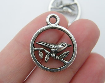 12 Bird on a branch circle charms  tibetan silver B13