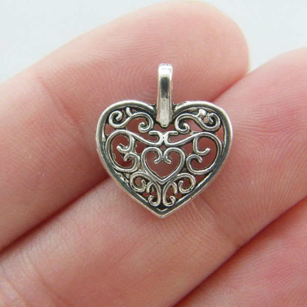 8 pendentifs coeur argent tibétain H94