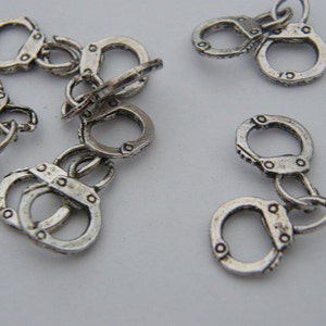 BULK 30 Pair of handcuff charms antique silver tone G24 image 3