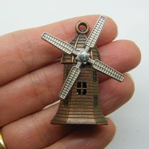 2 Windmill pendants copper and silver tone WT111