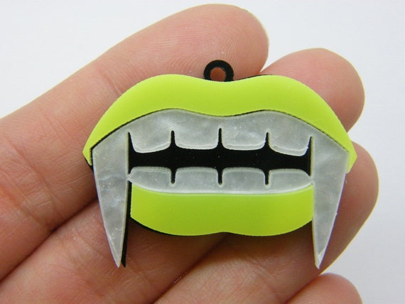 2 dents de vampire crocs pendentifs jaune fluo noir acrylique