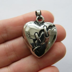 1  Heart broken mended pendant antique silver tone stainless steel H224