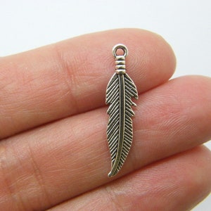 10 Feather pendants antique silver tone B20