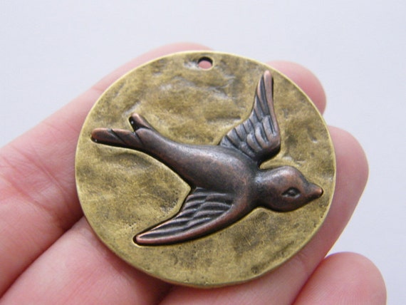1 Swallow bird charm antique bronze and copper tone BC140