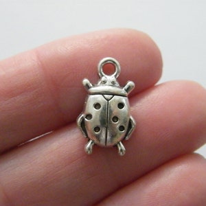 10 Ladybug charms antique silver tone A272