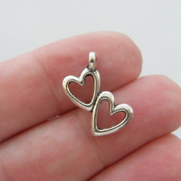 10 Heart charms tibetan silver H103