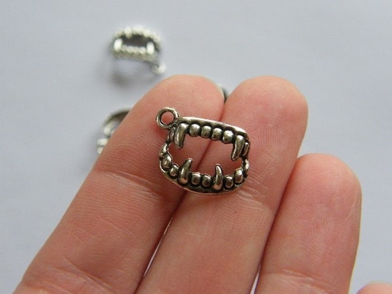Teeth and Fangs Charm Antiqued Sterling Silver Teeth and Fangs Charm Antiqued Sterling Silver