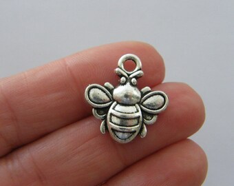 8 Bee charms antique silver tone A1087